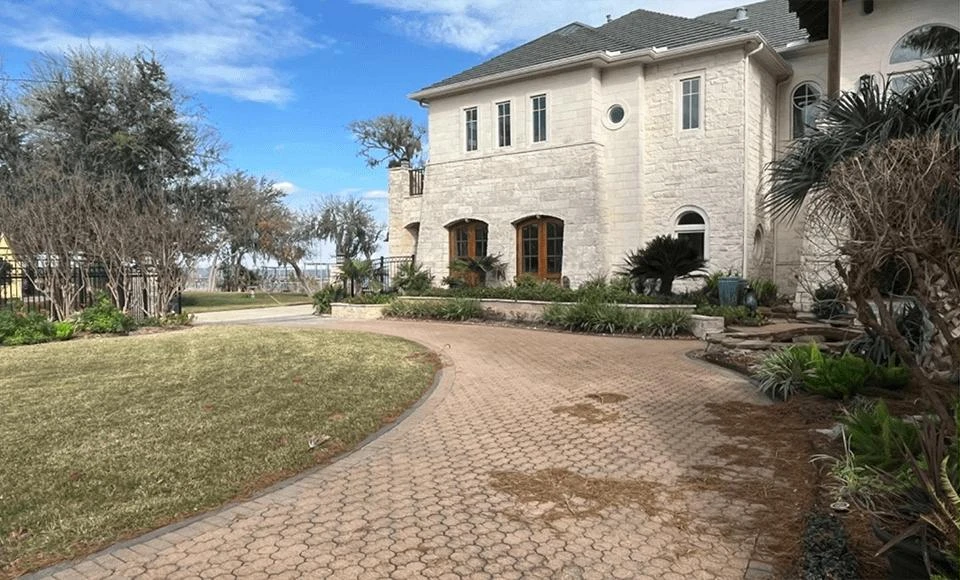 Aged Concrete to Interlocking Paver Driveway - Before